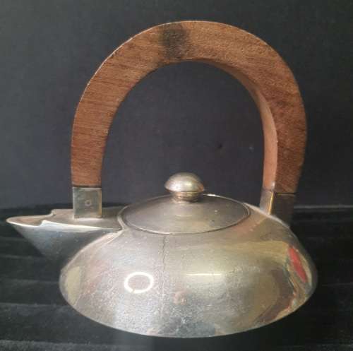 AN ART DECOR VINTAGE TEA SET WITH WOODEN HANDLES