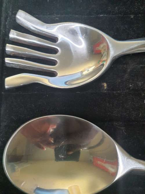 AN ART DECOR CUTTLERY SET SPOON AND LADEL