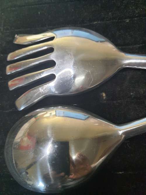 AN ART DECOR CUTTLERY SET SPOON AND LADEL