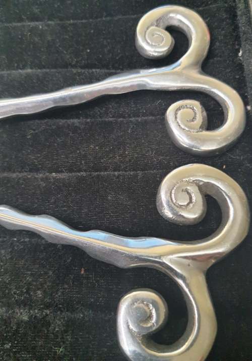 AN ART DECOR CUTTLERY SET SPOON AND LADEL