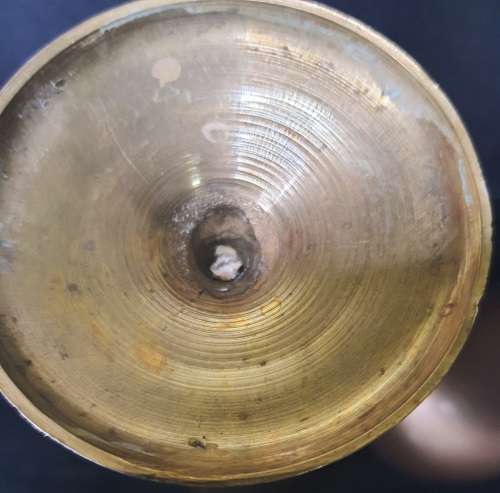 A VINTAGE BRASS WINE INGOT AND A BRASS VASE SOLD AS IS