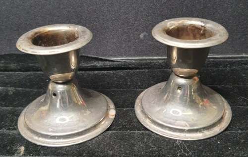 2 VINTAGE SILVER PLATED CANDLE HOLDERS SOLD AS IS