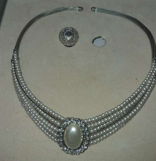 A VINTAGE COSTUME CHOKER NECKLACES WITH SIMULATED PEARLS AND DIAMANTE