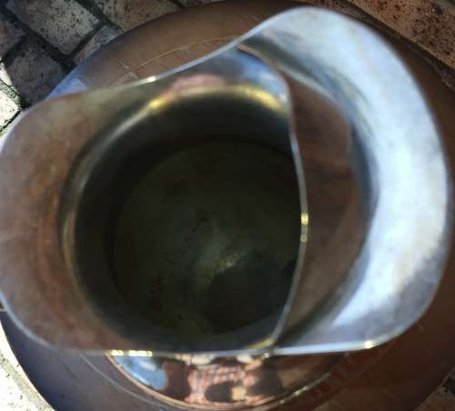 A ROMAN STYLE EPNS WATER OR WINE JUG SOLD AS IS