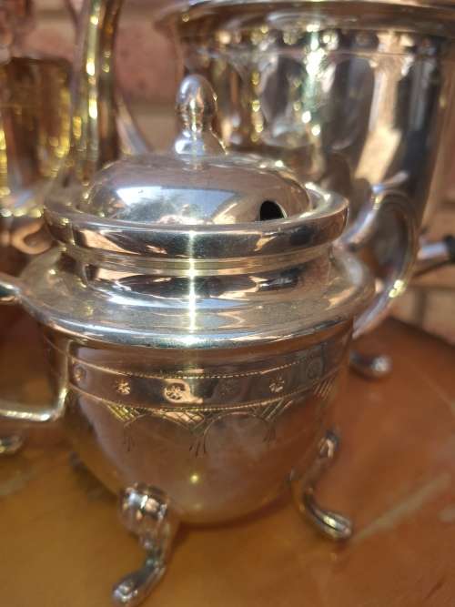 A VINTAGE SILVER PLATED TEA SET ,