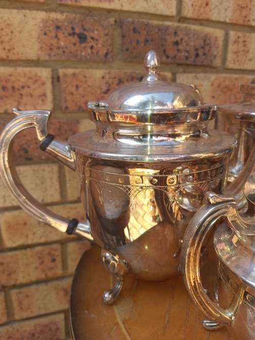 A VINTAGE SILVER PLATED TEA SET ,