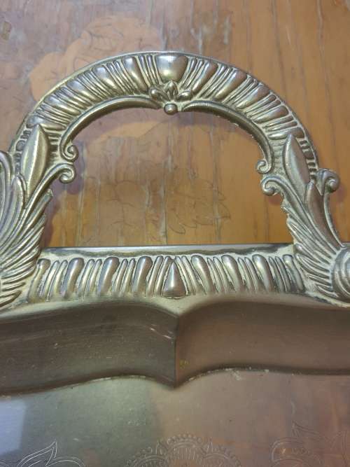 A VINTAGE EDWARDIAN STYLE SILVER PLATED SERVING  TRAY SOLD AS IS