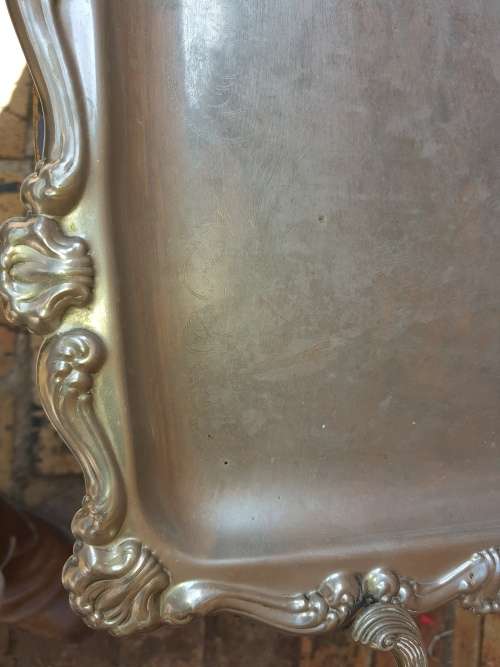 AN EDWARDIAN STYLE SILVER PLATED SERVING TRAY LARGE VERY ORNATE IN DESIGN TRAY SOLD AS IS