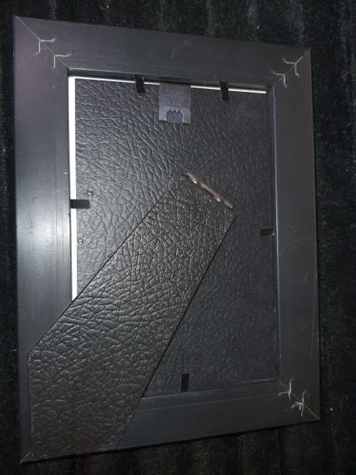 A COLLECTION OF PICTURE FRAMES SOLD AS IS