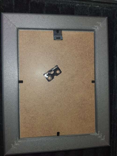 A COLLECTION OF PICTURE FRAMES SOLD AS IS