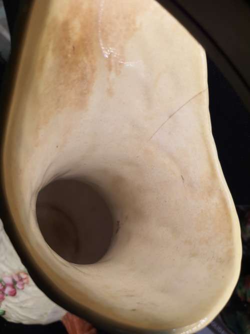 AN ORNATE VINTAGE CERAMIC PORCELAIN WATER JUG
