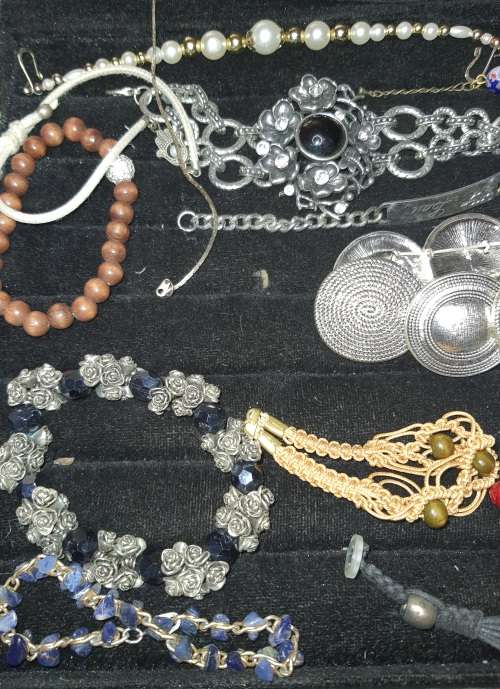 AN EXCEPTIONAL COLLECTION OF VINTAGE BRACELETS SOLD AS IS