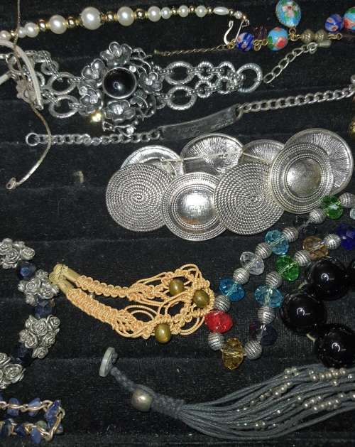 AN EXCEPTIONAL COLLECTION OF VINTAGE BRACELETS SOLD AS IS
