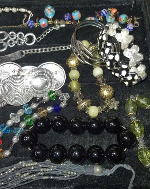 AN EXCEPTIONAL COLLECTION OF VINTAGE BRACELETS SOLD AS IS