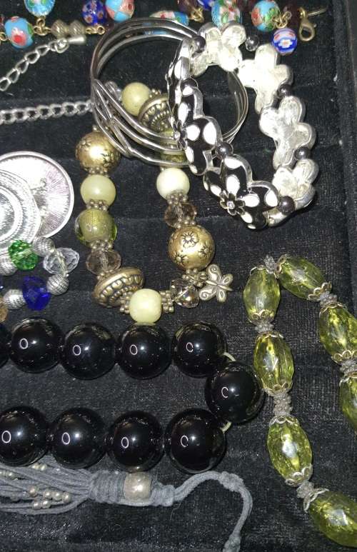 AN EXCEPTIONAL COLLECTION OF VINTAGE BRACELETS SOLD AS IS