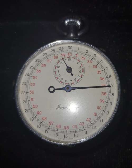 A vintage pocket timer watch missing the face glass , but in working condition sold as is