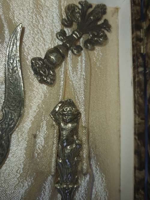 AN ANTIQUE ORNATE SALAD SERVING SET LADEL AND FORK