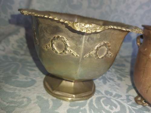 TWO VINTAGE BOWLS OR TABLE TOP FLOWER POTS A BRONZE COPPER AND A SILVER PLATED POT