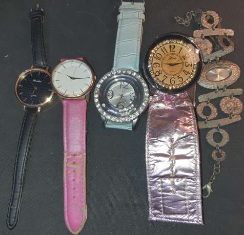 A COLLECTION OF WOMANS DRESS WATCHES SOLD AS IS NOT TESTED