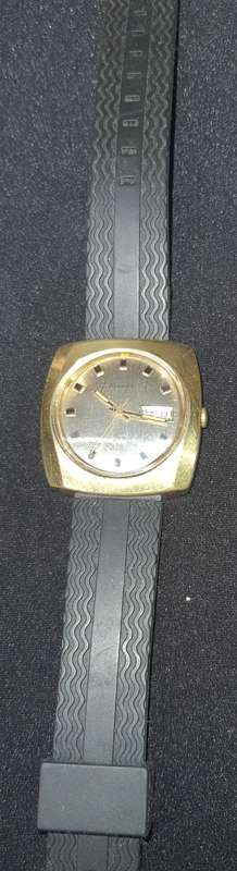 A VINTAGE HIGHLY COLLECTABLE NIVADA AUTOMATIC GOLD WATCH SWISS MADE