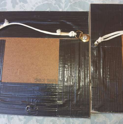 TWO PIECES OF ART BY UNKNOWN ARTIST MADE IN JULY 2004 SOLD AS IS