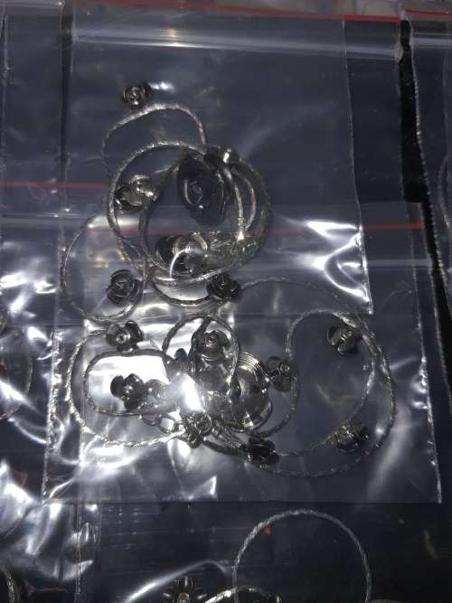 A MASSIVE BULK JOBLOT FANCY EARRINGS AND NECKLACES SILVER PLATED CHAINS AND FLORAL DESIGN  PENDANTS