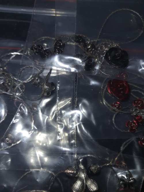 A MASSIVE BULK JOBLOT FANCY EARRINGS AND NECKLACES SILVER PLATED CHAINS AND FLORAL DESIGN  PENDANTS