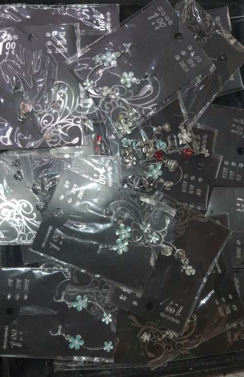 A MASSIVE BULK JOBLOT FANCY EARRINGS AND NECKLACES SILVER PLATED CHAINS AND FLORAL DESIGN  PENDANTS