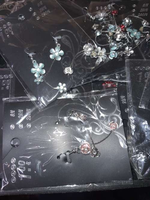 A MASSIVE BULK JOBLOT FANCY EARRINGS AND NECKLACES SILVER PLATED CHAINS AND FLORAL DESIGN  PENDANTS