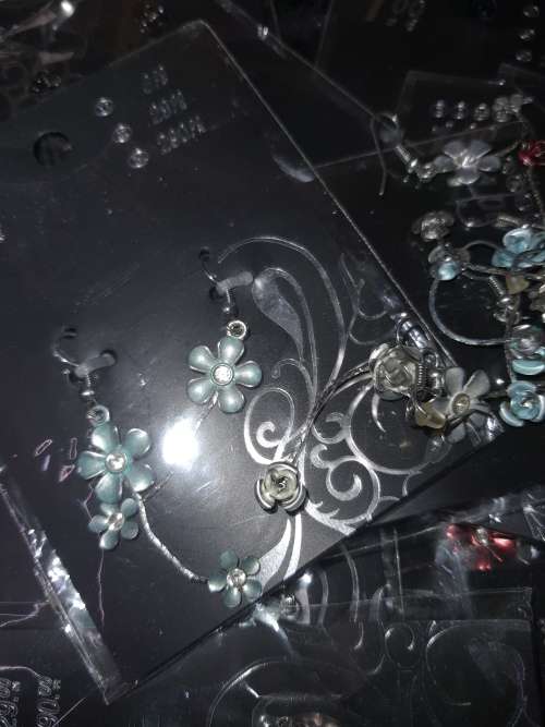 A MASSIVE BULK JOBLOT FANCY EARRINGS AND NECKLACES SILVER PLATED CHAINS AND FLORAL DESIGN  PENDANTS