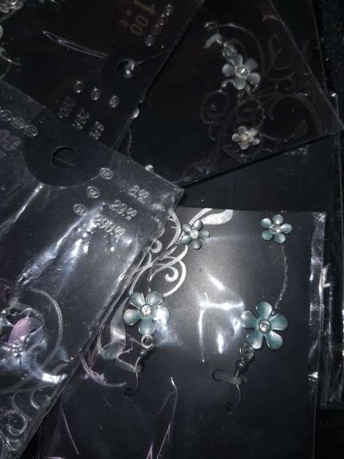 A MASSIVE BULK JOBLOT FANCY EARRINGS AND NECKLACES SILVER PLATED CHAINS AND FLORAL DESIGN  PENDANTS