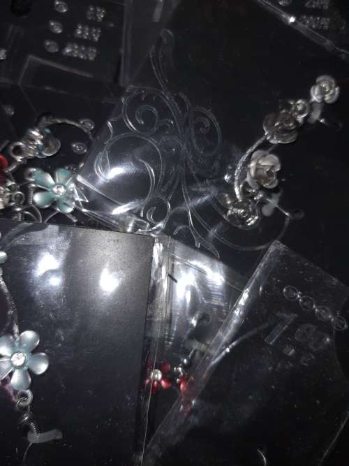 A MASSIVE BULK JOBLOT FANCY EARRINGS AND NECKLACES SILVER PLATED CHAINS AND FLORAL DESIGN  PENDANTS
