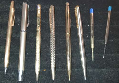 A COLLECTION OF GOLD PLATED PENS AND PENCILS FOR THE COLLECTORS SOLD AS IS