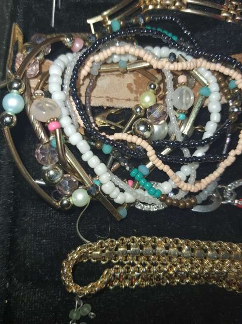 A RARE BULK COLLECTION OF QUALITY COSTUME BANGES AND BRACELETS SOLD AS IS