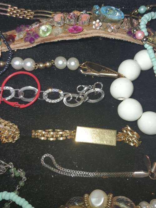 A RARE BULK COLLECTION OF QUALITY COSTUME BANGES AND BRACELETS SOLD AS IS