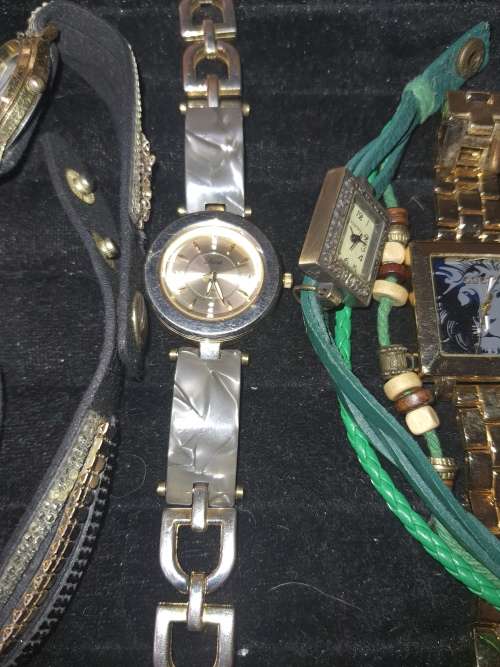 A JOBLOT FANCY WOMANS DRESS WATCHES SOLD AS IS NOT TESTED