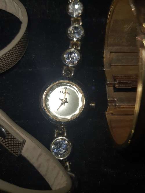 A JOBLOT FANCY WOMANS DRESS WATCHES SOLD AS IS NOT TESTED