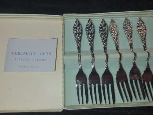 A COLLECTION SET DESERT FORKS CHROMATA RUSTLESS FORKS MADE IN HOLLAND SOLD AS IS