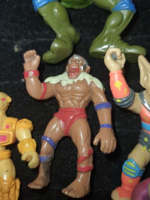 A COLLECTION OF VINTAGE TOYS SOLD AS IS