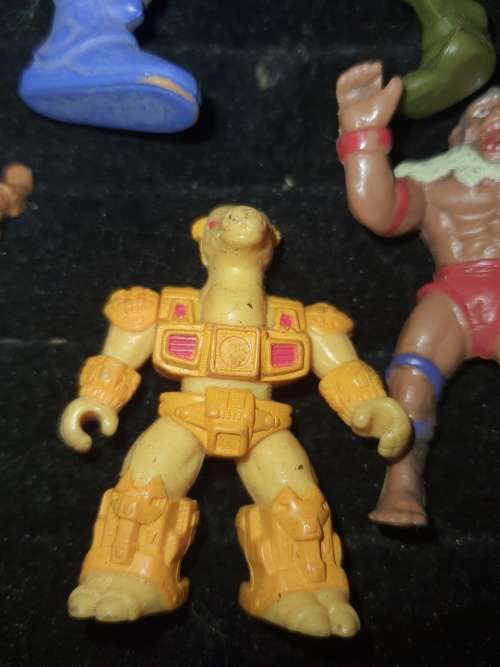 A COLLECTION OF VINTAGE TOYS SOLD AS IS