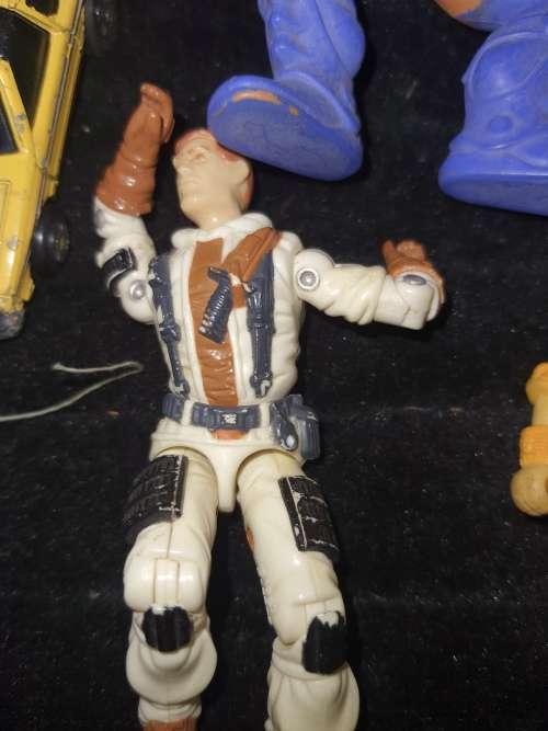 A COLLECTION OF VINTAGE TOYS SOLD AS IS