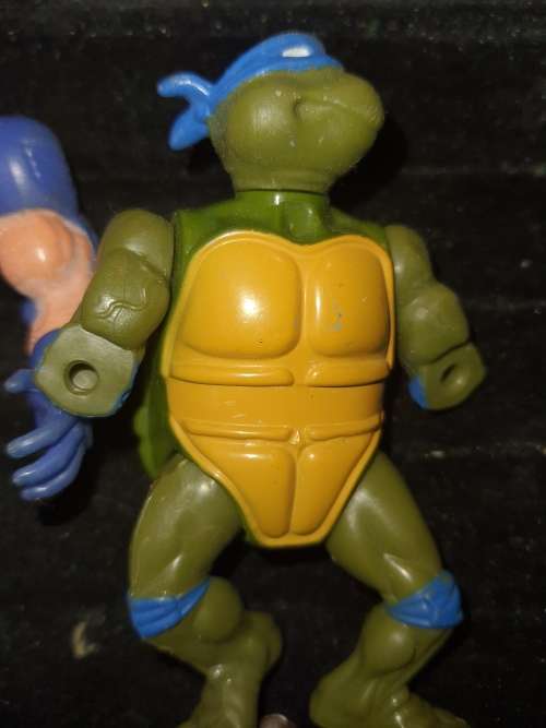 A COLLECTION OF VINTAGE TOYS SOLD AS IS