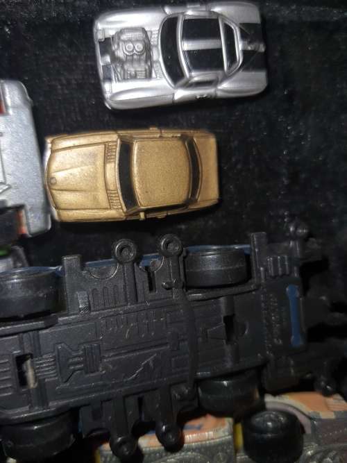 A COLLECTION OF VINTAGE TOYS SOLD AS IS