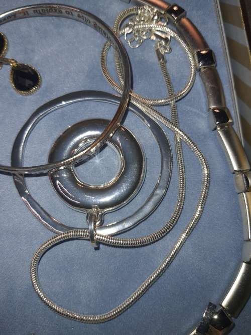 TWO SETS OF COSTUME SILVER PLATED NECKACE SETS SOLD AS IS