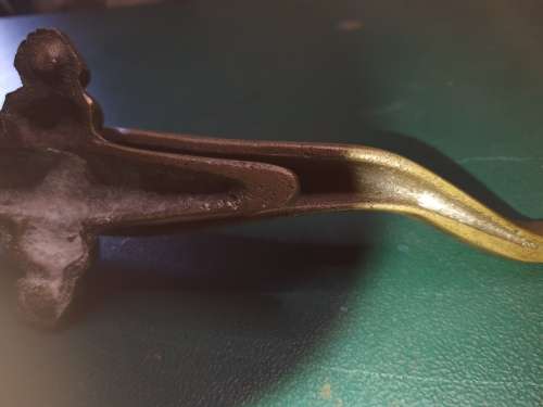 AN ANTIQUE BRASS CROCODILE NUT CRACKER 38CMS IN LENGTH