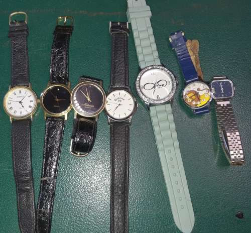 A COLLECTION OF WOMANS COSTUME WATCHES SOLD AS IS NOT TESTED