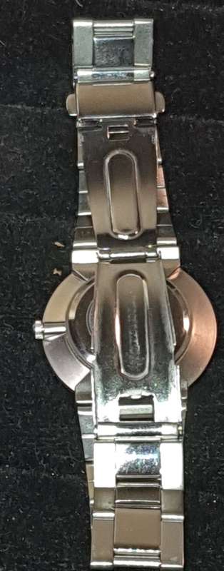AN 18KT WHITE GOLD PLATED ROYALTY SWISS MOVEMENT WRIST WATCH SOLD AS IS NOT TESTED