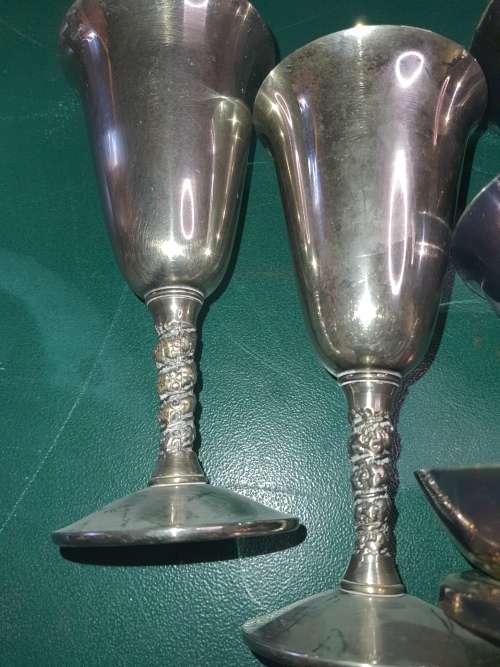 A JOBLOT VINTAGE EP ON COPPER AND EP ON BRASS WINE INGOTS AND EP SERVING TOWER SOLD AS IS