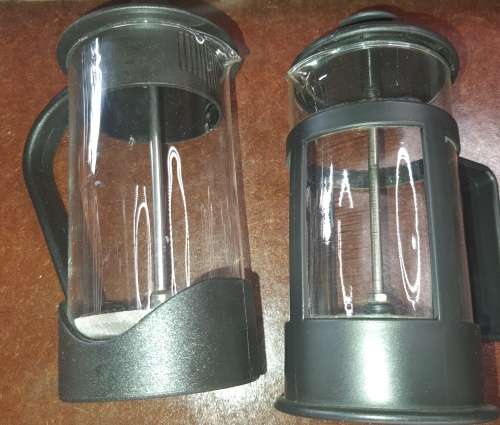 TWO IN PERFACT CONDITION COFFEE PLUNGES SOLD AS IS