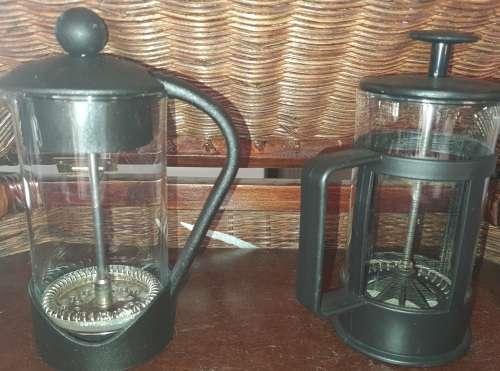 TWO IN PERFACT CONDITION COFFEE PLUNGES SOLD AS IS